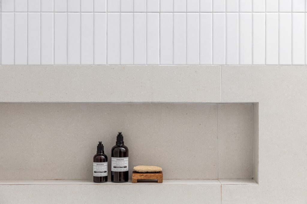Detail: long shower niche in light stone