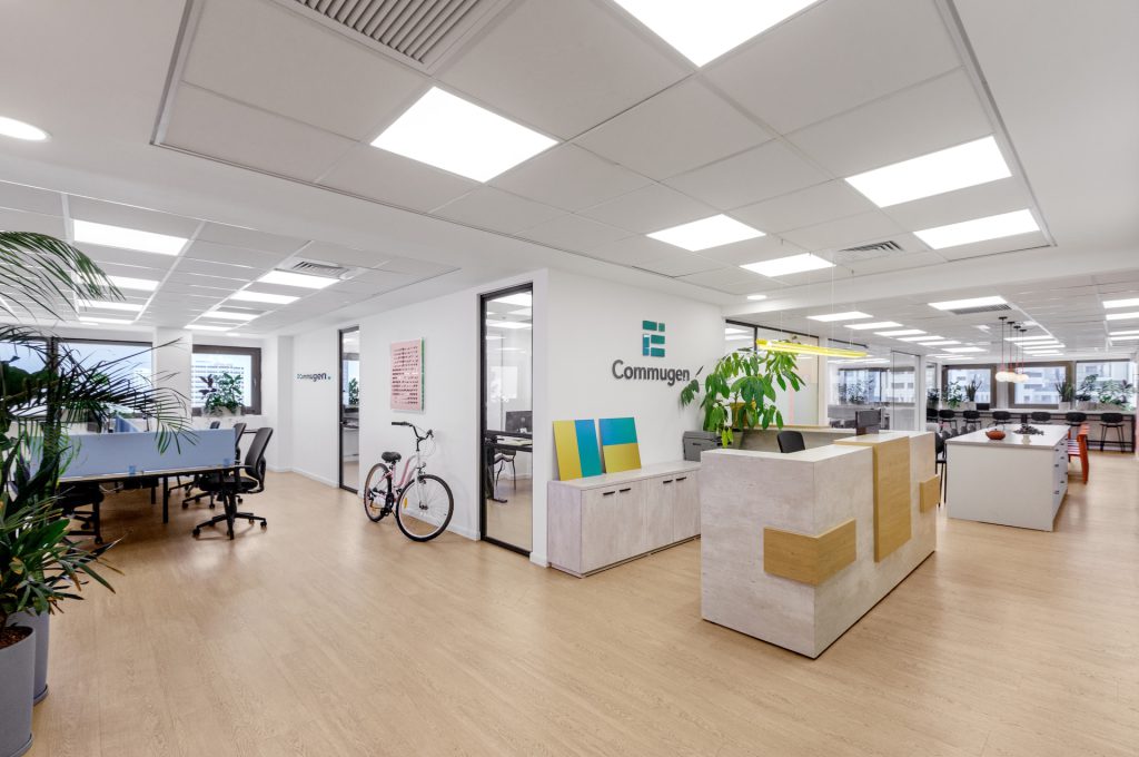 Reception counter and an open office with planters