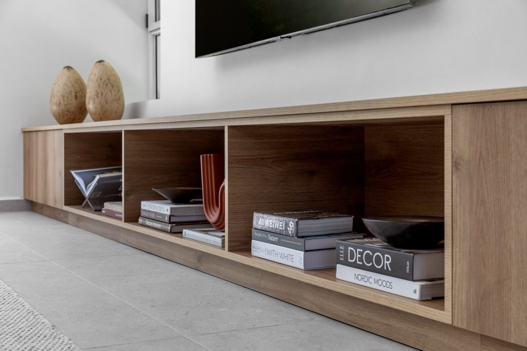 Low wooden TV unit with open compartments