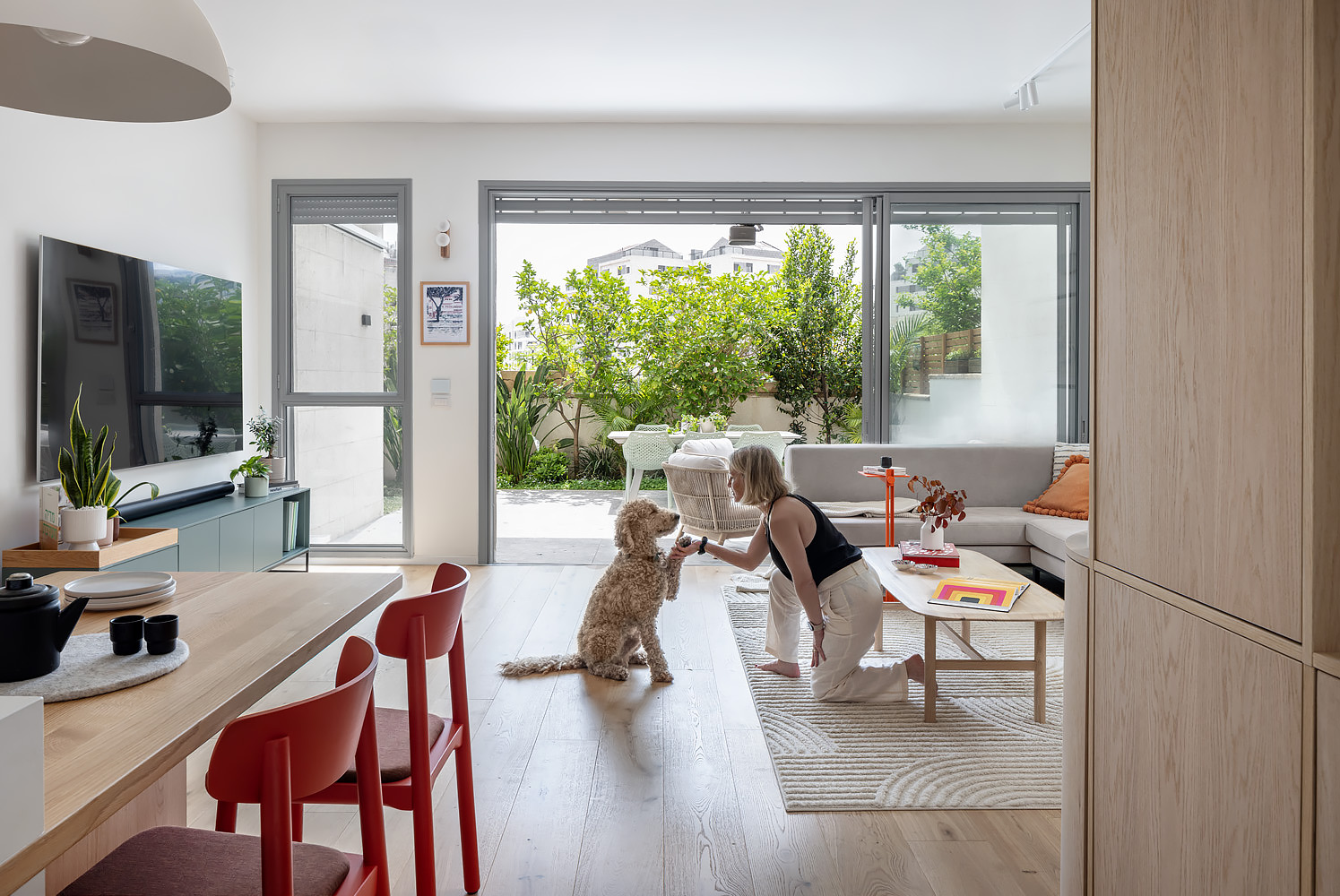 View from the dining area to the living room and garden