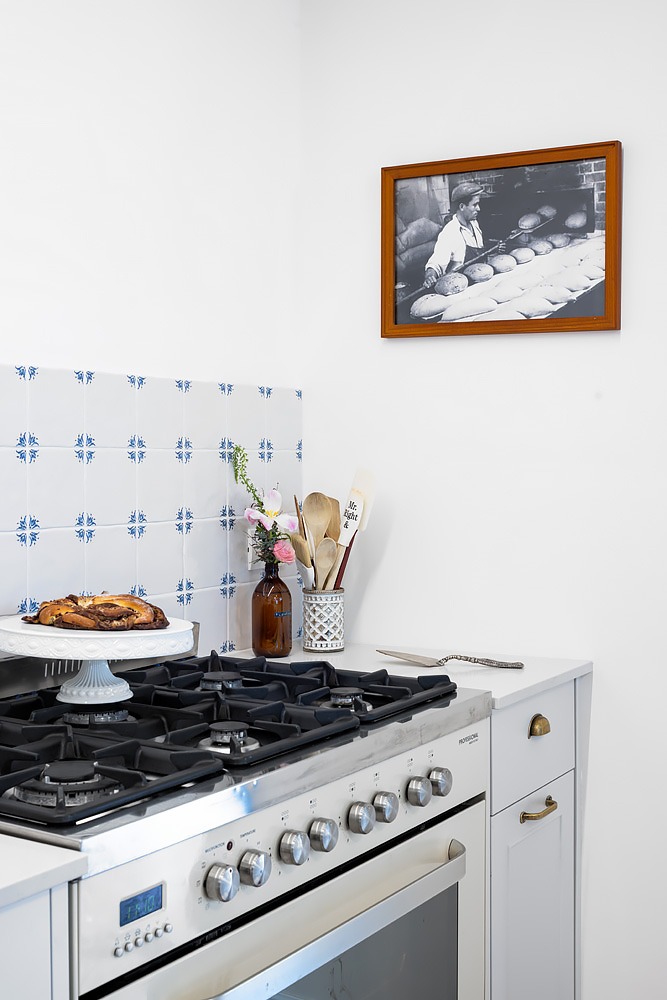 Detail: range cooker against patterned tiles