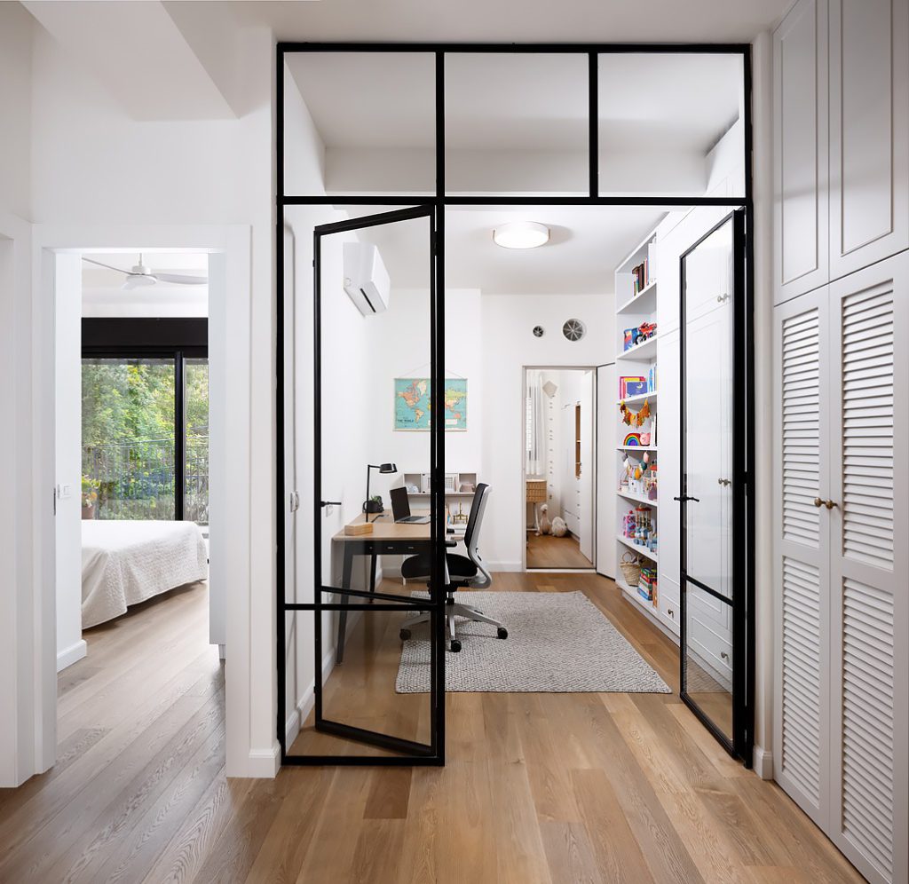 Black-framed glass doors to a study