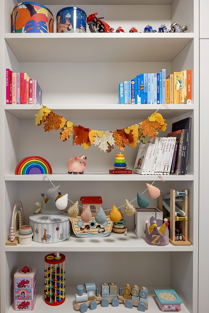 Detail: toy and book shelves in the kids' room