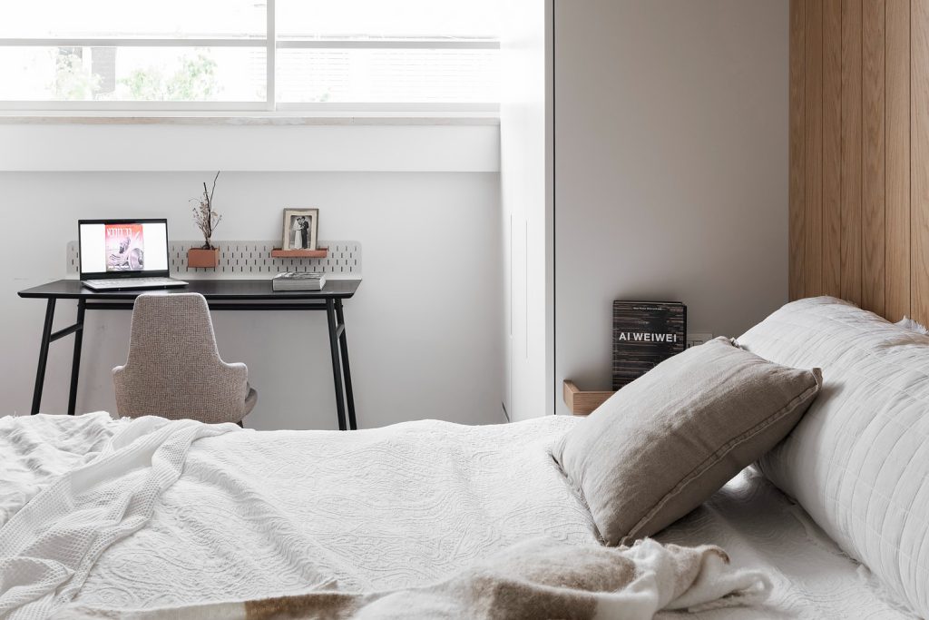 Small desk by the window in the bedroom