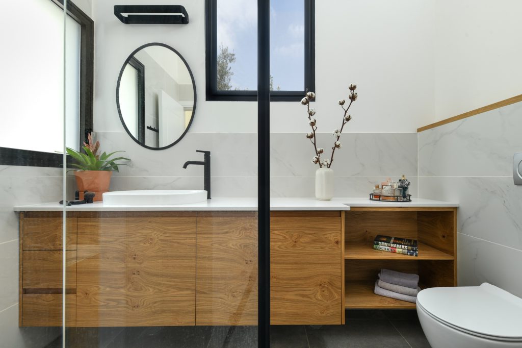 Long wooden vanity with open shelves