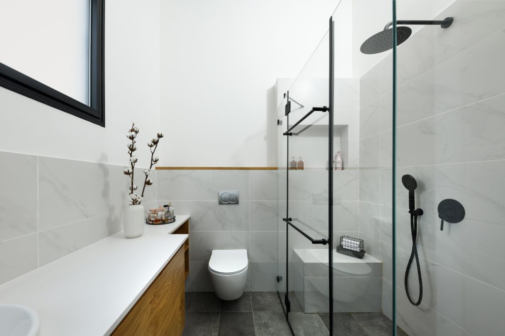 Glass shower with black fittings